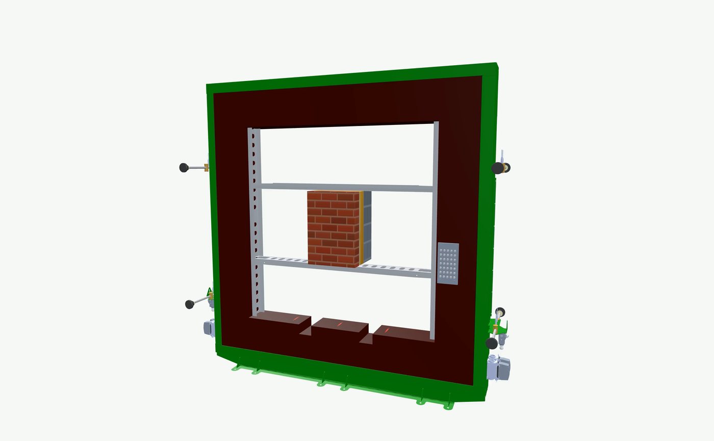 A masonry wall specimen mounted in the thermal frame, sealed into the opening between the two chambers.